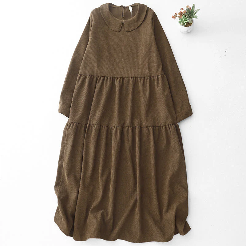 Abito midi a maniche lunghe in velluto a coste con colletto alla Peter Pan, tasche e bottoni con motivo Buddha Stones