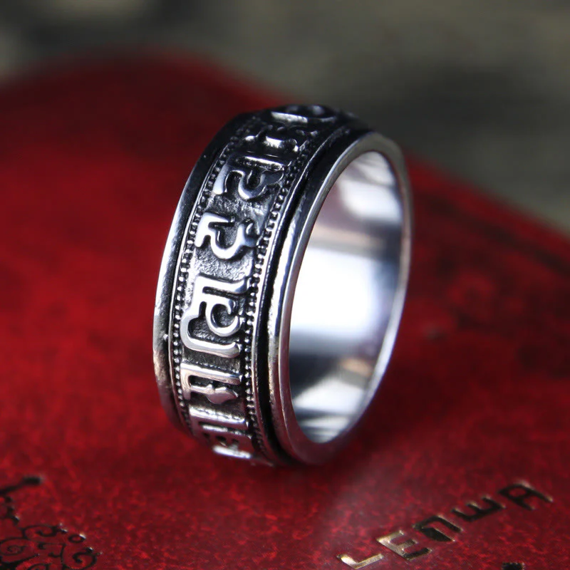 Anello di equilibrio girevole in acciaio al titanio Buddha Stones tibetane Om Mani Padme Hum