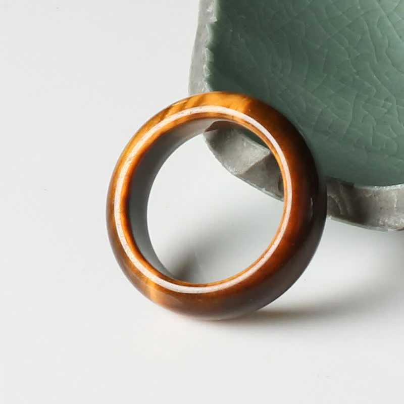Anello di protezione della forza della pietra dell'occhio di tigre Buddha Stones