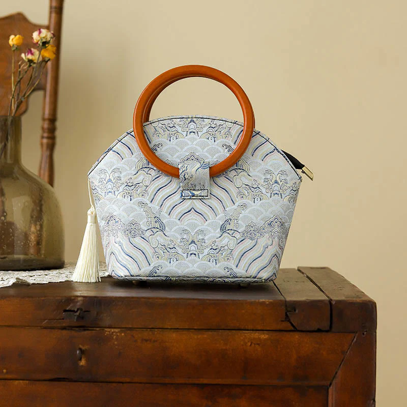 Borsa a mano con stampa a conchiglia di nuvole di buon auspicio Buddha Stones