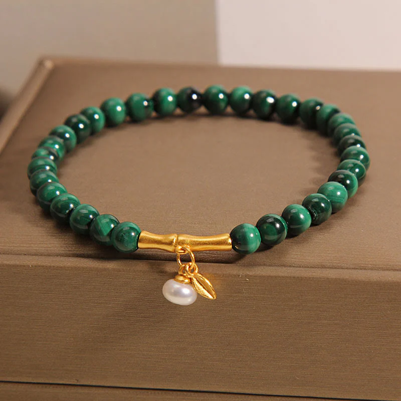 Bracciale anti-ansia in bambù portafortuna con perle di malachite naturale Buddha Stones