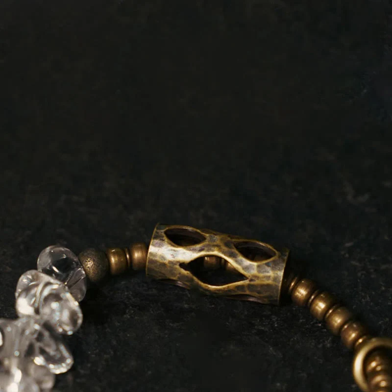 Bracciale Buddha Stones con cristalli bianchi irregolari e purezza del rame - Image 8