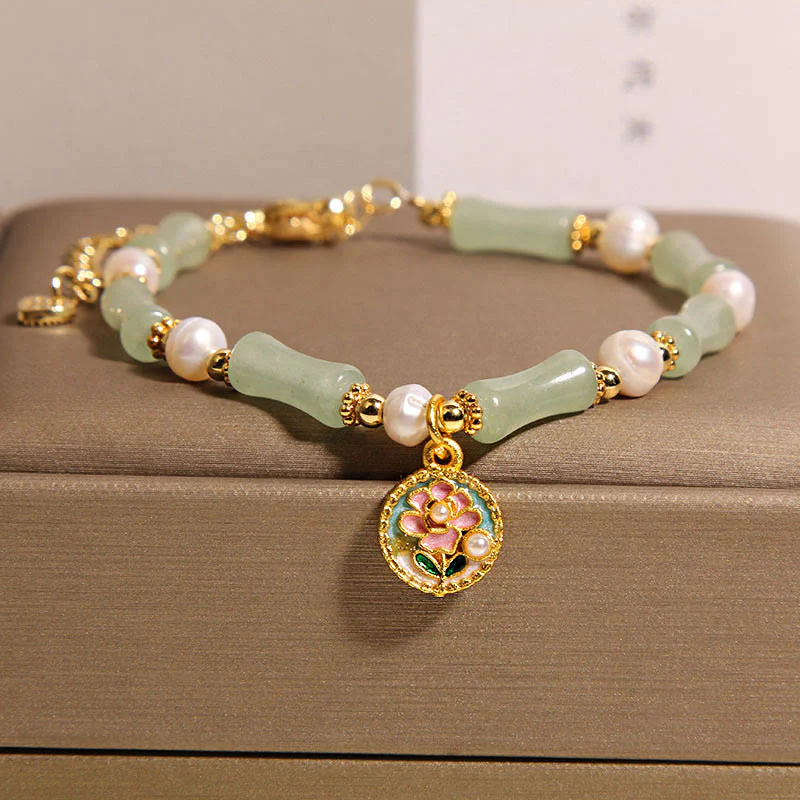 Bracciale Buddha Stones con fiore di bambù naturale, avventurina verde e perle