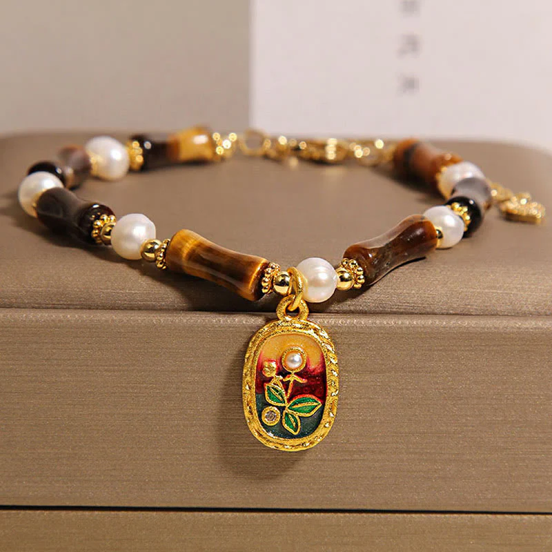 Bracciale Buddha Stones in bambù naturale con occhio di tigre e perle