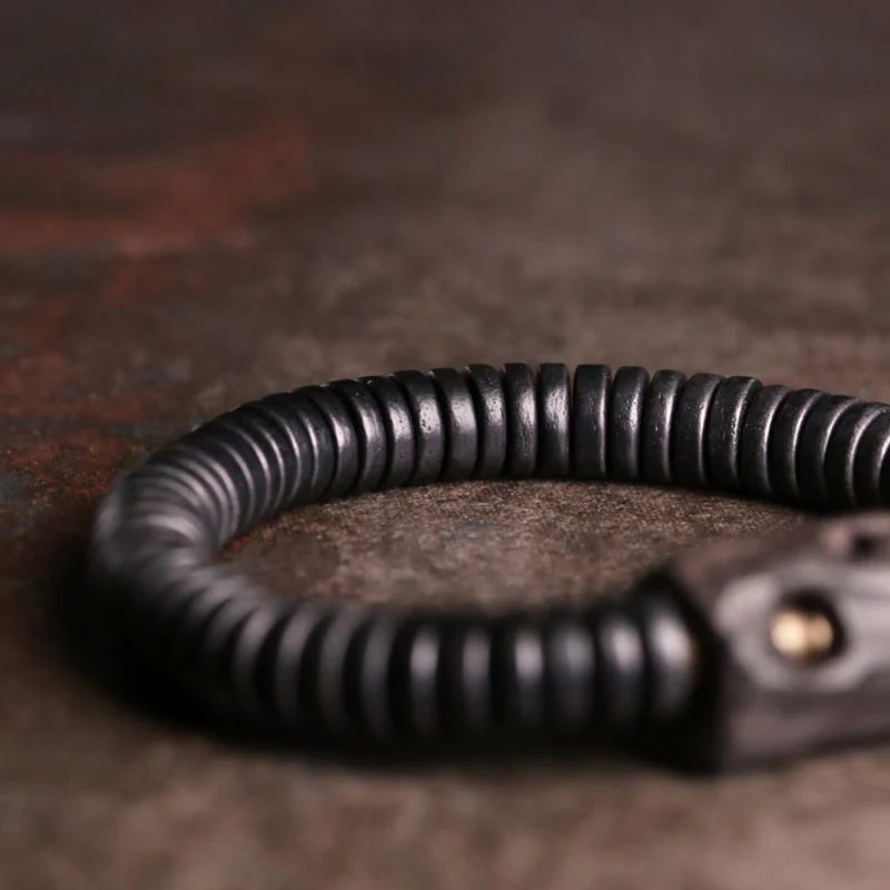 Bracciale Buddha Stones in legno di ebano, rame e ottone con fori per l'equilibrio - Image 8