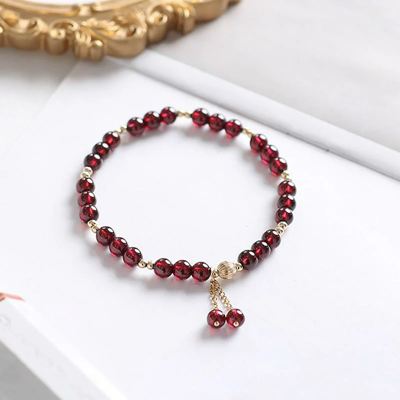 Bracciale Buddha Stones in lega placcata oro 14K con granato naturale e calma - Image 2