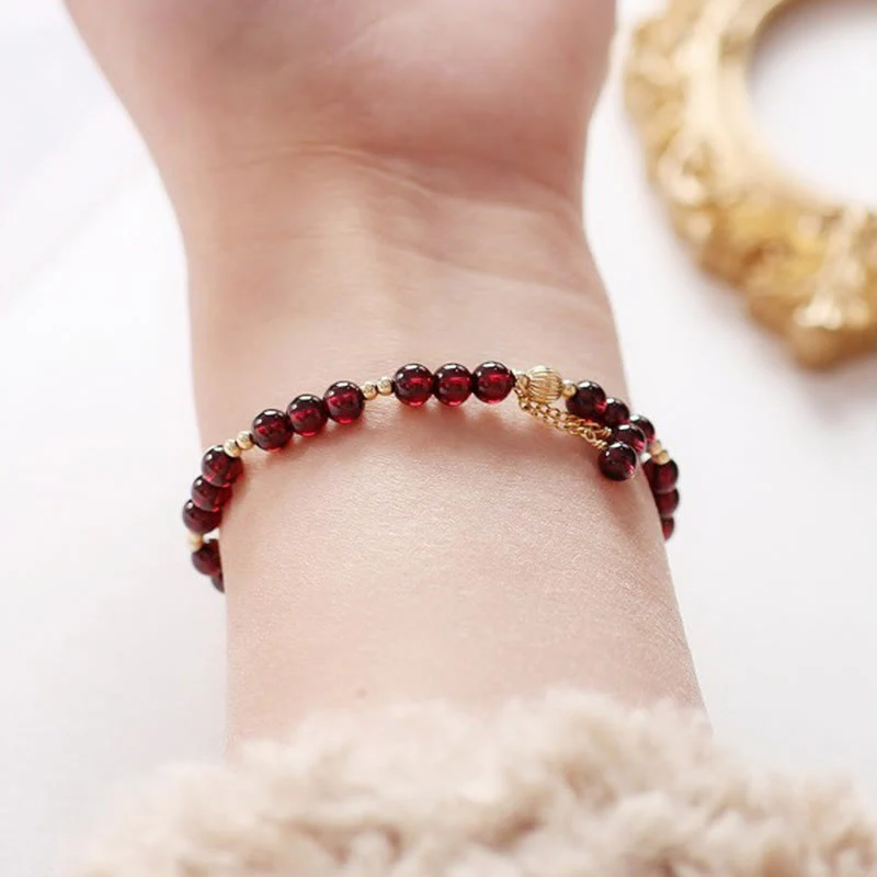 Bracciale Buddha Stones in lega placcata oro 14K con granato naturale e calma - Image 8