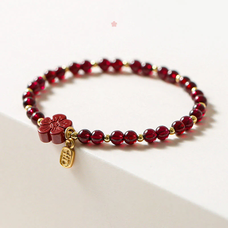 Bracciale Buddha Stones in oro 14K con granato naturale e fiore di cinabro e calma - Image 3