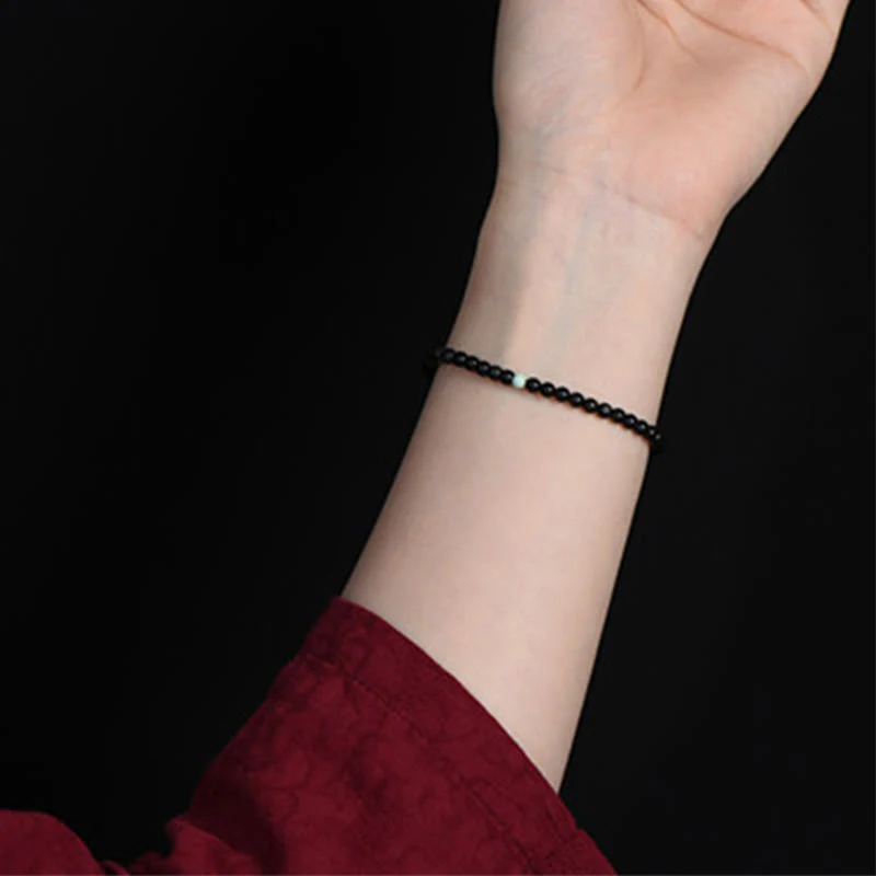 Bracciale Buddha Stones in ossidiana nera, turchese e forza per la realizzazione - Image 8