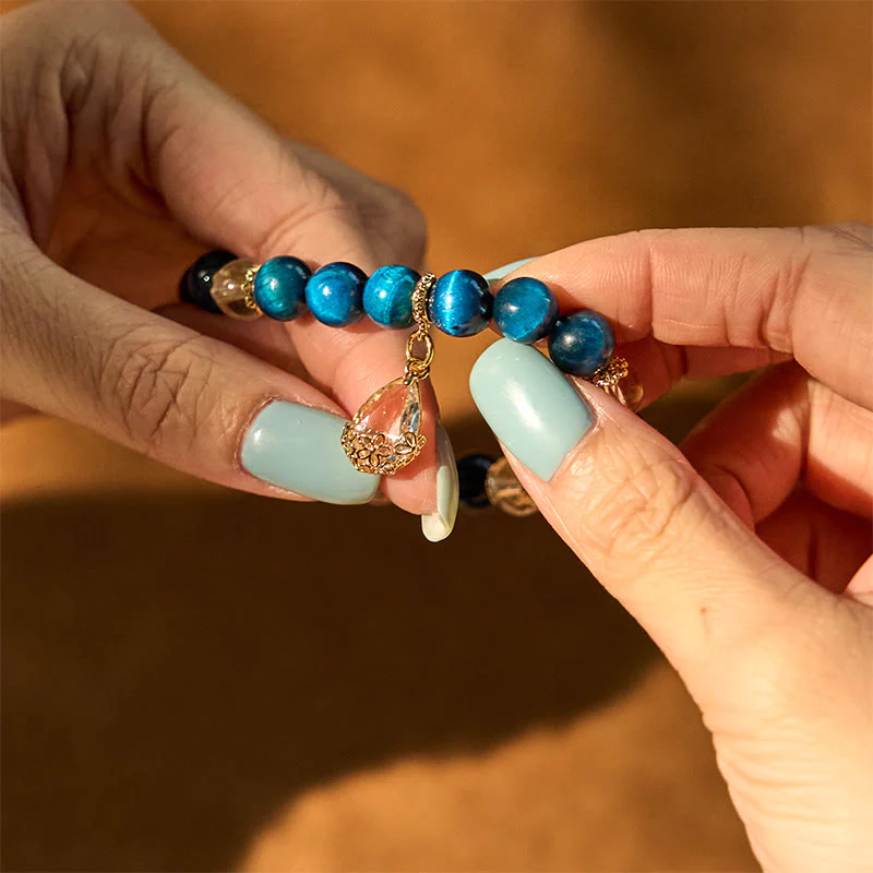 Bracciale Buddha Stones Occhio di Tigre Blu Cristallo Bianco Goccia d'Acqua Forza - Image 6