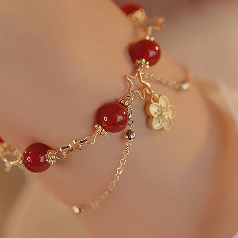 Bracciale Buddha Stones placcato oro 14k con ciondolo a forma di fiore di agata rossa e stella - Image 10
