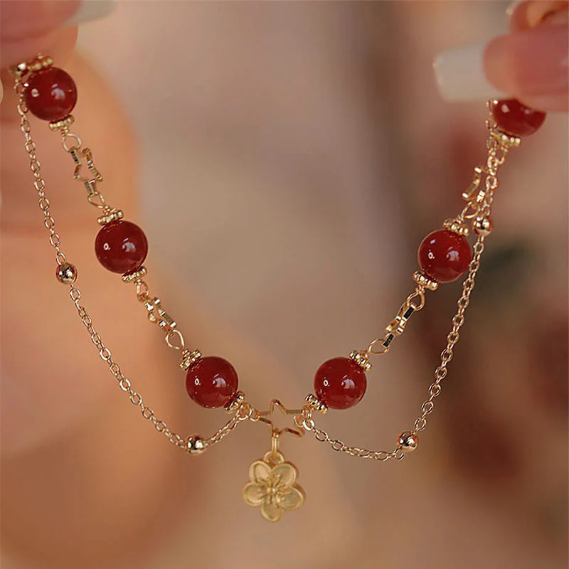 Bracciale Buddha Stones placcato oro 14k con ciondolo a forma di fiore di agata rossa e stella - Image 3