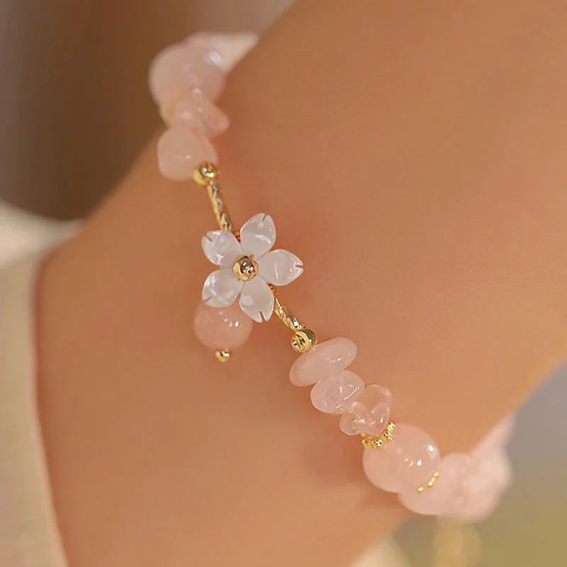 Bracciale Buddha Stones placcato oro 14k con fiore di cristallo rosa naturale