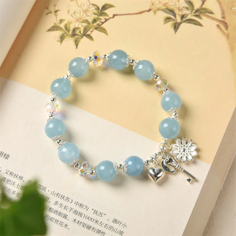 Bracciale con ciondolo a forma di chiave dell'amore con fiore di serenità in argento sterling 925 e acquamarina naturale Buddha Stones - Image 2