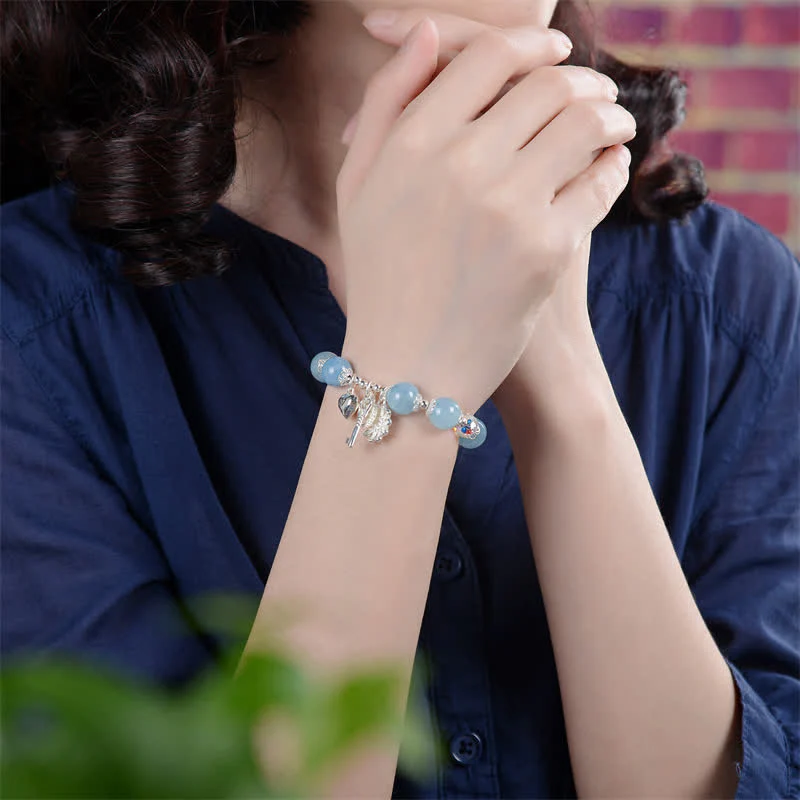 Bracciale con ciondolo a forma di chiave dell'amore con fiore di serenità in argento sterling 925 e acquamarina naturale Buddha Stones - Image 3