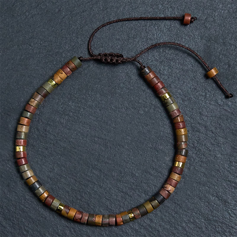 Bracciale con perline distanziatrici in rodonite e Buddha Stones per la guarigione delle relazioni