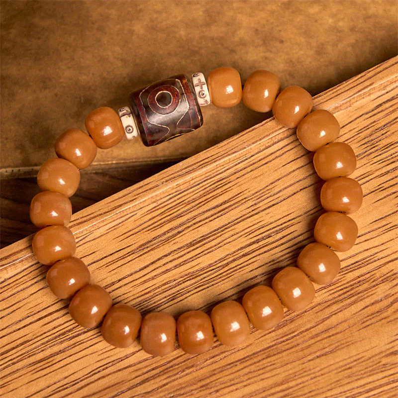 Bracciale con perline Dzi e semi di Bodhi tibetani di Buddha Stones, per tenere lontani gli spiriti maligni - Image 2
