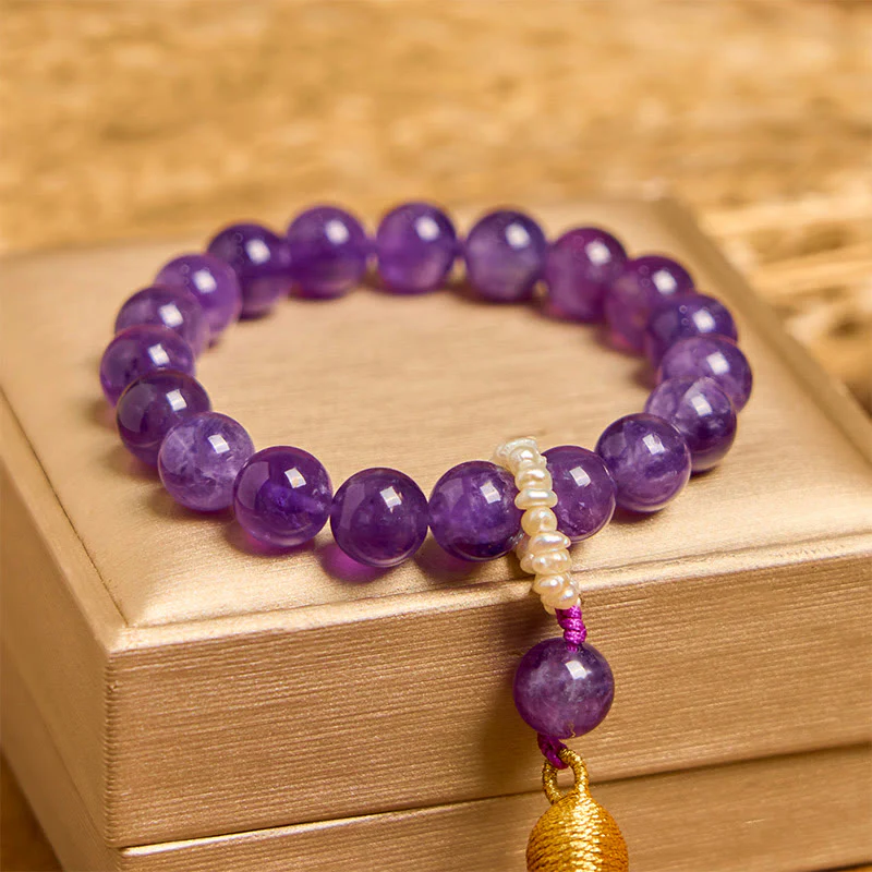 Bracciale da meditazione con nappe e perle di ametista naturale Buddha Stones - Image 2