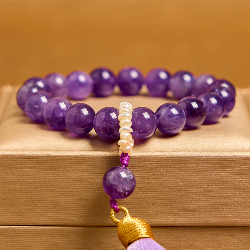 Bracciale da meditazione con nappe e perle di ametista naturale Buddha Stones - Image 3