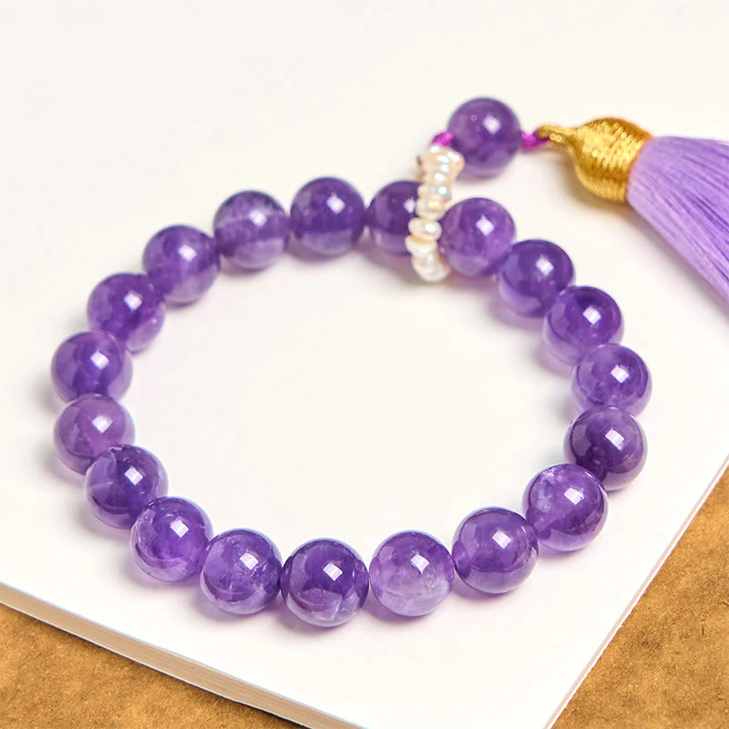 Bracciale da meditazione con nappe e perle di ametista naturale Buddha Stones - Image 4
