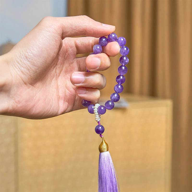 Bracciale da meditazione con nappe e perle di ametista naturale Buddha Stones - Image 7