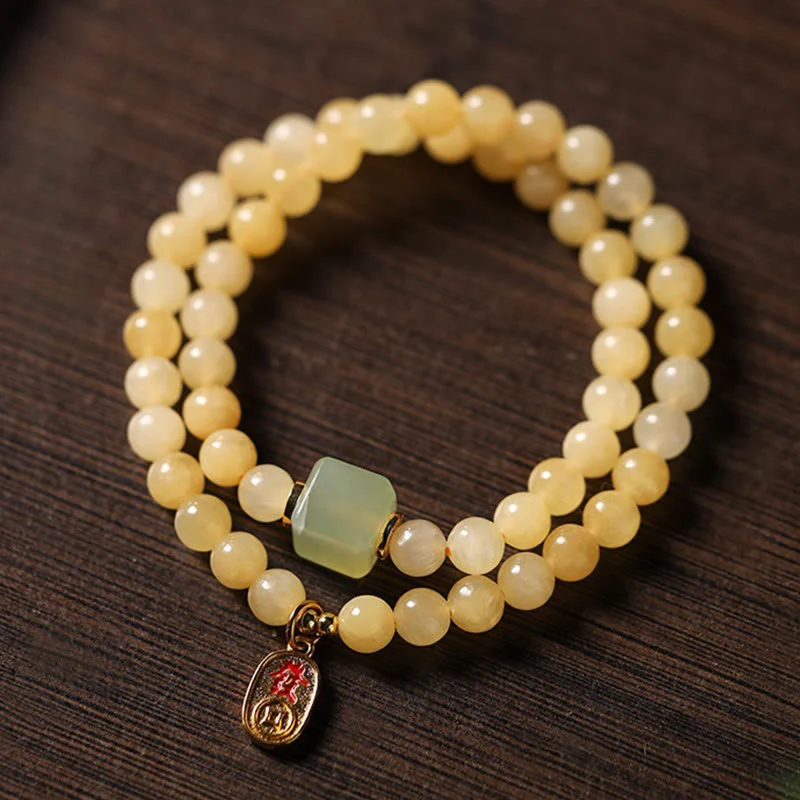 Bracciale della ricchezza con doppio cerchio, Buddha Stones di topazio e cubo di giada