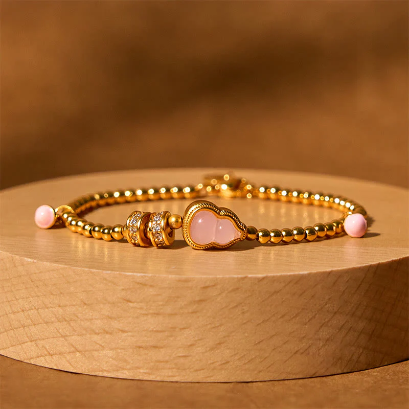 Bracciale della ricchezza con perline di zucca placcate in rame e ottone Buddha Stones