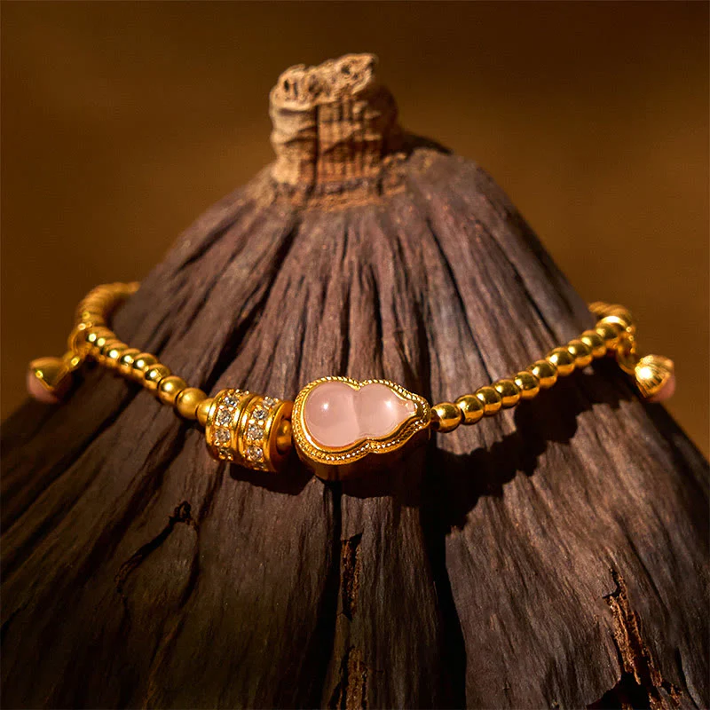 Bracciale della ricchezza con perline di zucca placcate in rame e ottone Buddha Stones - Image 2