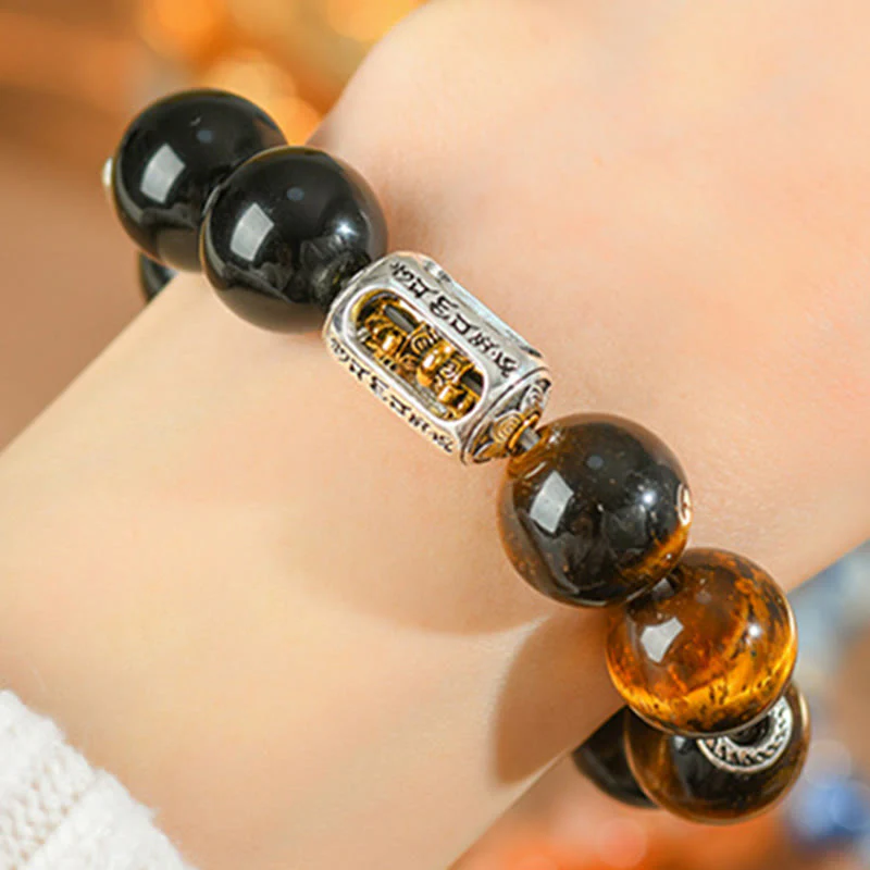 Bracciale di protezione Vajra in ossidiana naturale con occhio di tigre e argento lucido Buddha Stones - Image 10