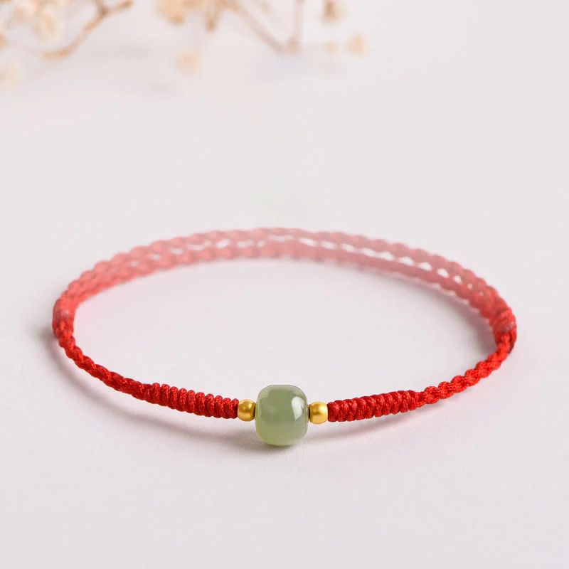 Bracciale intrecciato con Buddha Stones e portafortuna