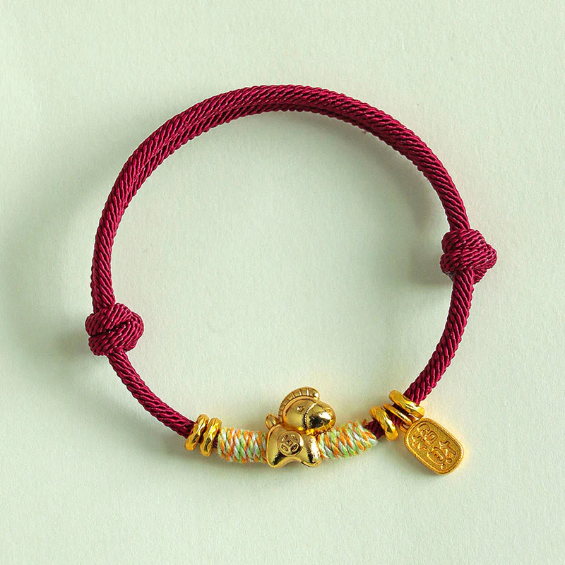 Bracciale intrecciato con ciondolo portafortuna e cordino rosso e nero dell'anno del cavallo Buddha Stones - Image 10