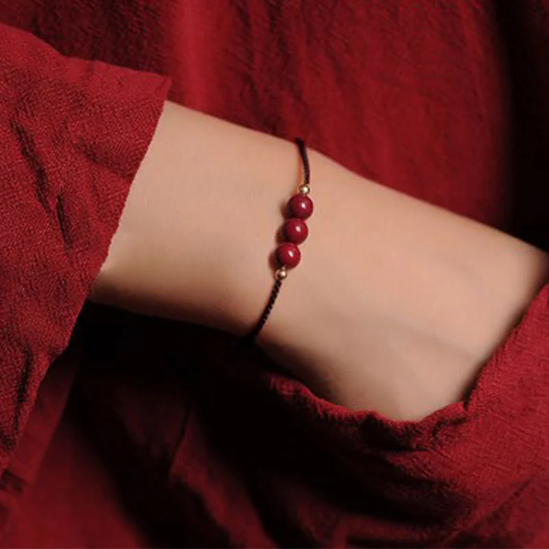 Bracciale intrecciato con corda di benedizione in cinabro naturale placcato oro 14K Buddha Stones - Image 15