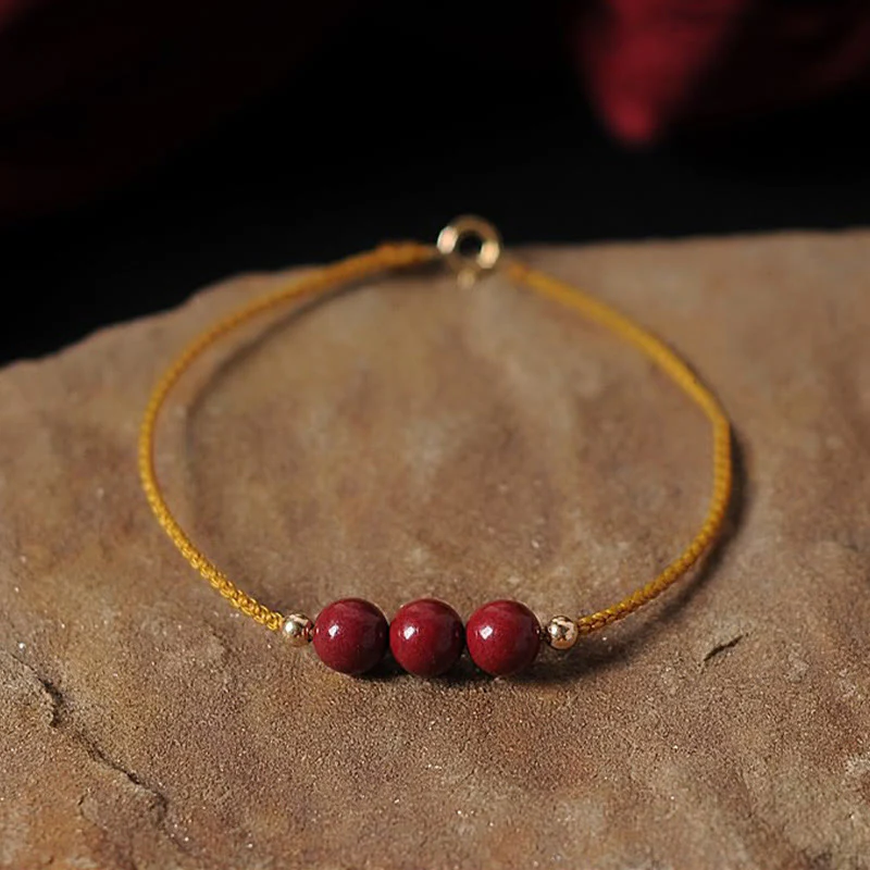 Bracciale intrecciato con corda di benedizione in cinabro naturale placcato oro 14K Buddha Stones - Image 3
