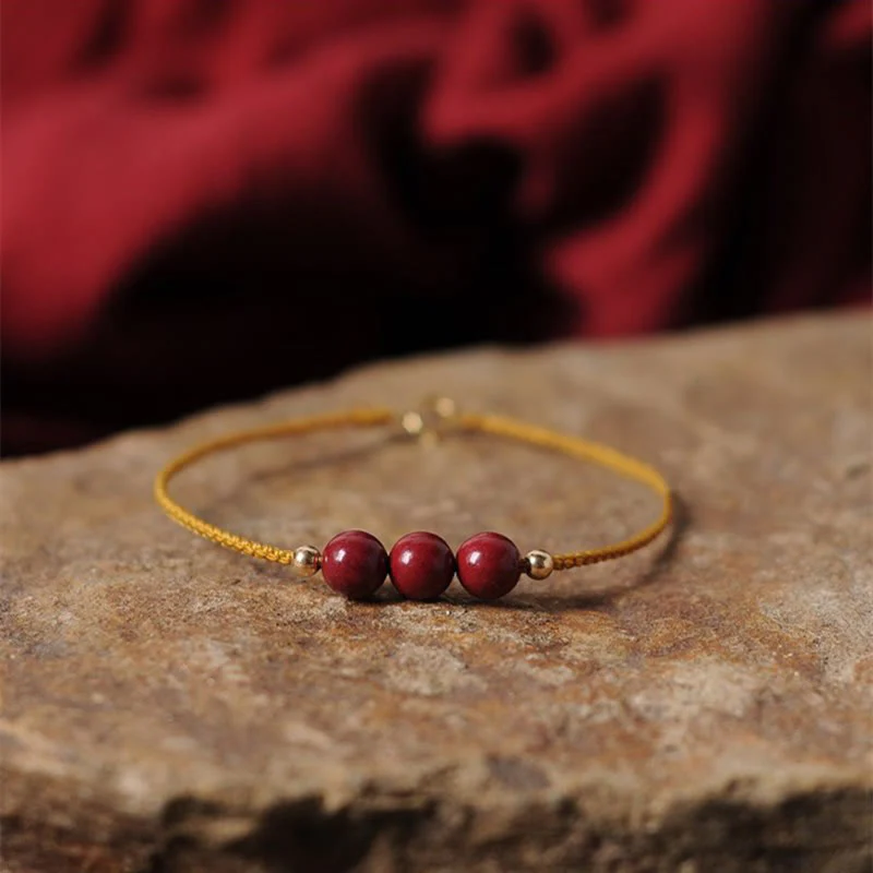 Bracciale intrecciato con corda di benedizione in cinabro naturale placcato oro 14K Buddha Stones - Image 4