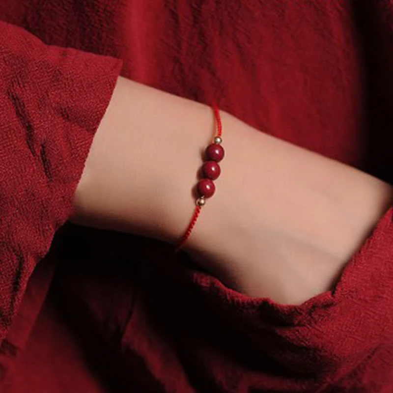 Bracciale intrecciato con corda di benedizione in cinabro naturale placcato oro 14K Buddha Stones - Image 9