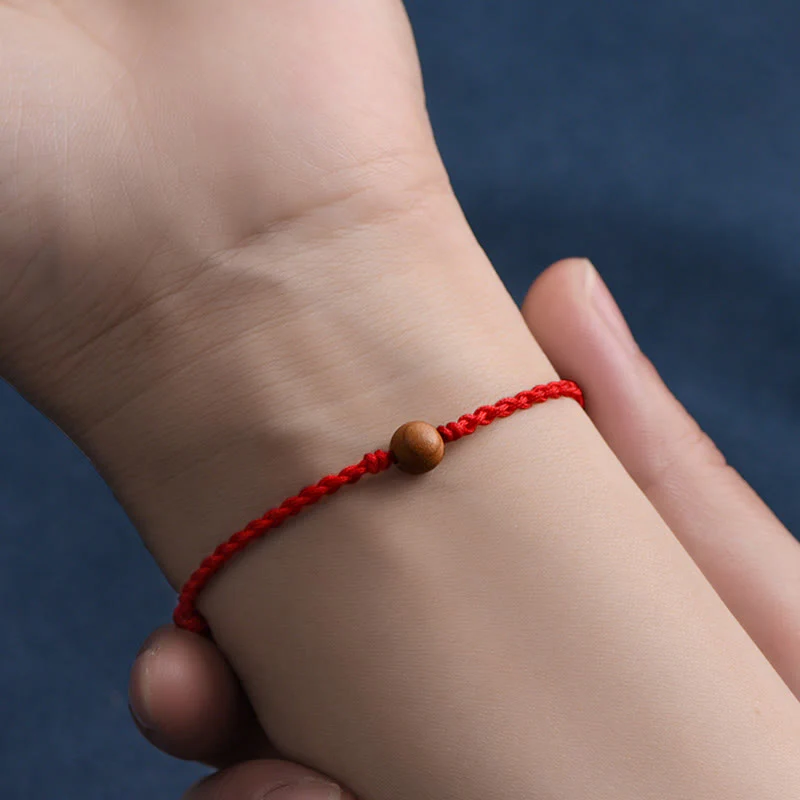 Bracciale intrecciato con perline di legno di pesca naturale Buddha Stones che allontanano gli spiriti maligni - Image 10