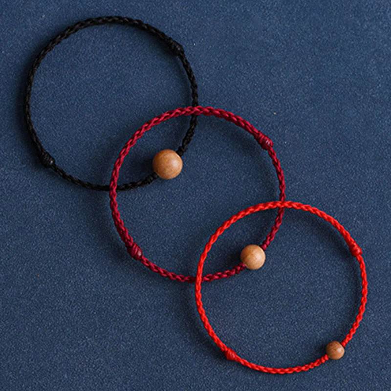 Bracciale intrecciato con perline di legno di pesca naturale Buddha Stones che allontanano gli spiriti maligni - Image 3
