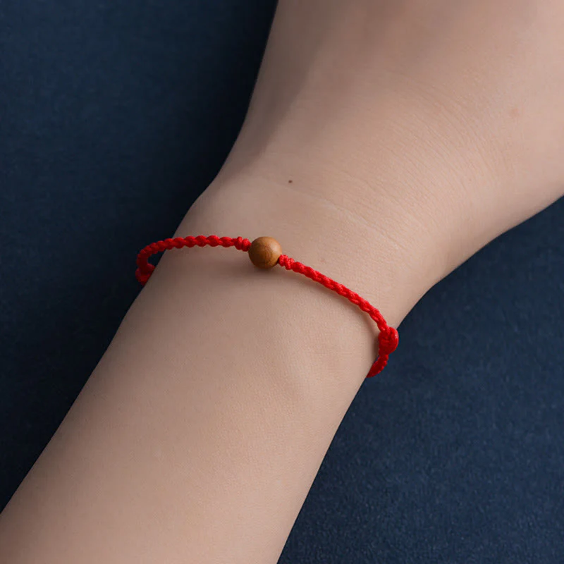 Bracciale intrecciato con perline di legno di pesca naturale Buddha Stones che allontanano gli spiriti maligni - Image 9