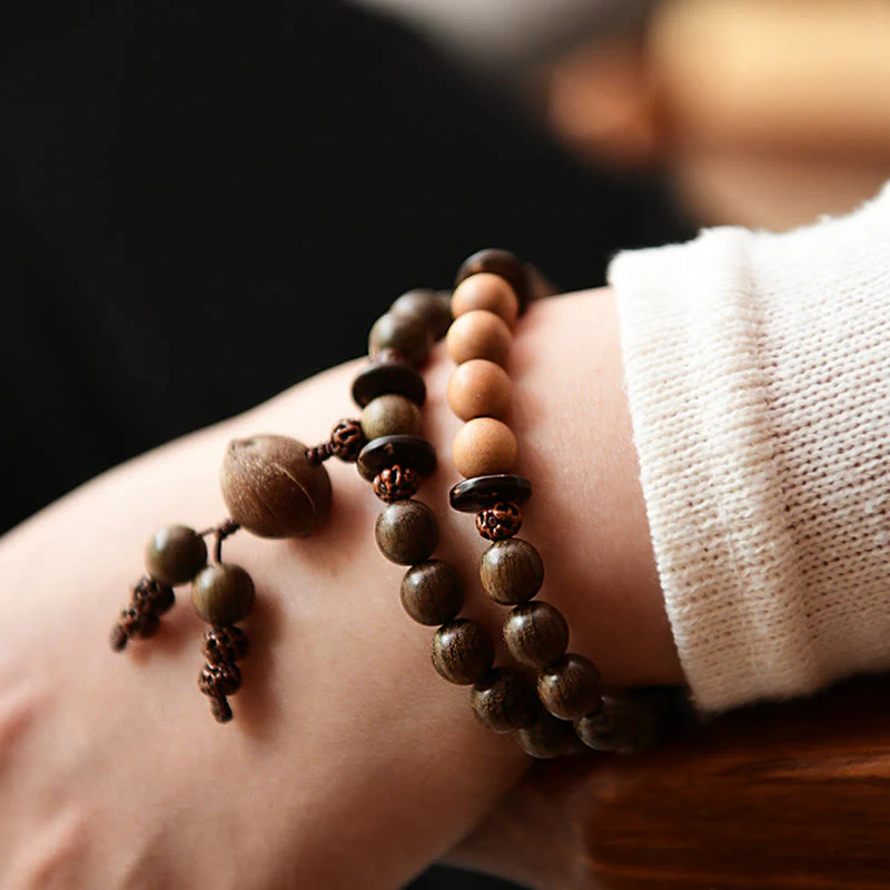 Bracciale Mala con ciondolo di protezione in legno di sandalo tibetano Buddha Stones - Image 3