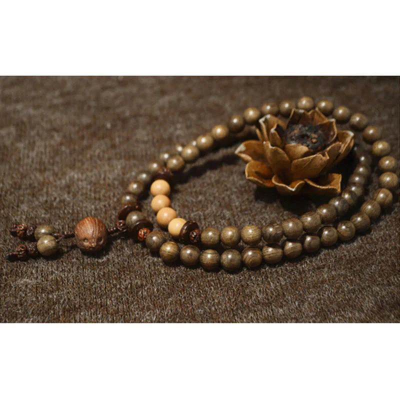 Bracciale Mala con ciondolo di protezione in legno di sandalo tibetano Buddha Stones - Image 6