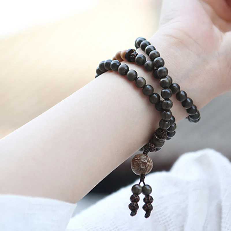 Bracciale Mala con ciondolo di protezione in legno di sandalo tibetano Buddha Stones - Image 7