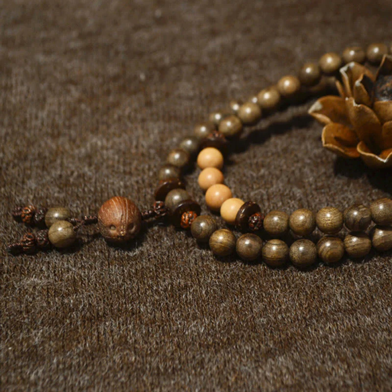 Bracciale Mala con ciondolo di protezione in legno di sandalo tibetano Buddha Stones - Image 9