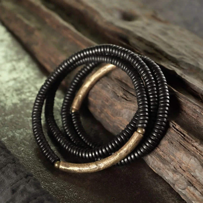 Bracciale multistrato in ottone, rame e legno di ebano Buddha Stones - Image 2