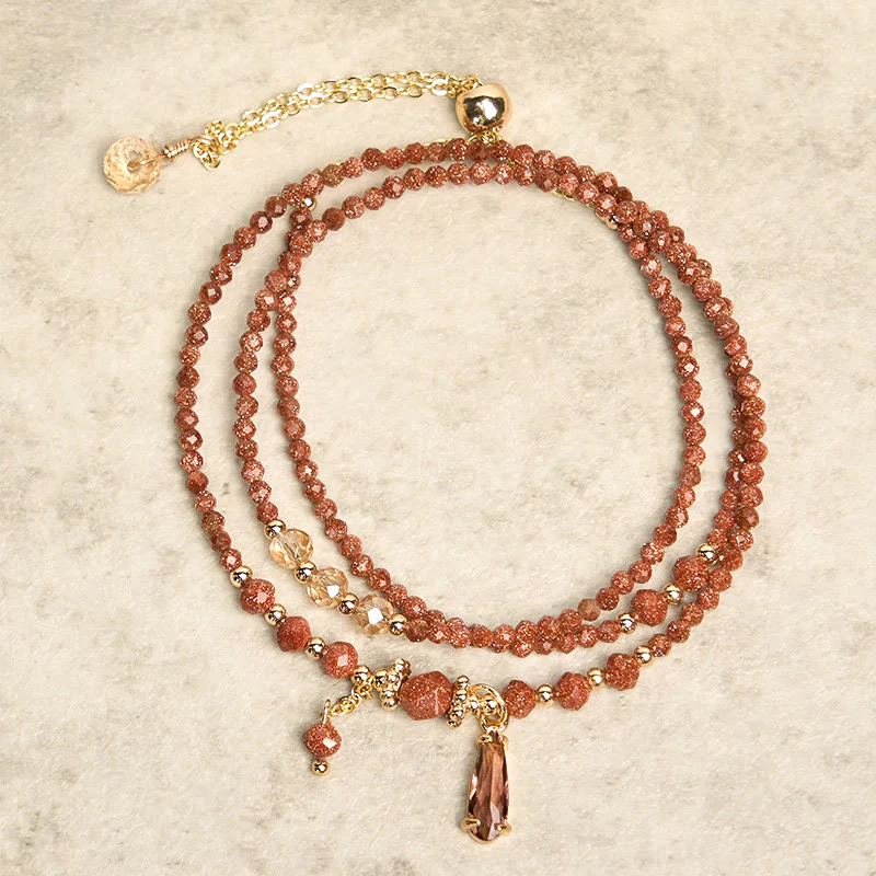 Bracciale multistrato positivo con perline di pietra d'oro naturale da 2 mm Buddha Stones - Image 2