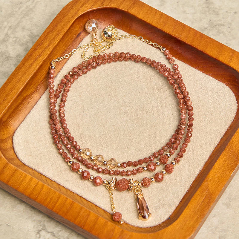 Bracciale multistrato positivo con perline di pietra d'oro naturale da 2 mm Buddha Stones - Image 3