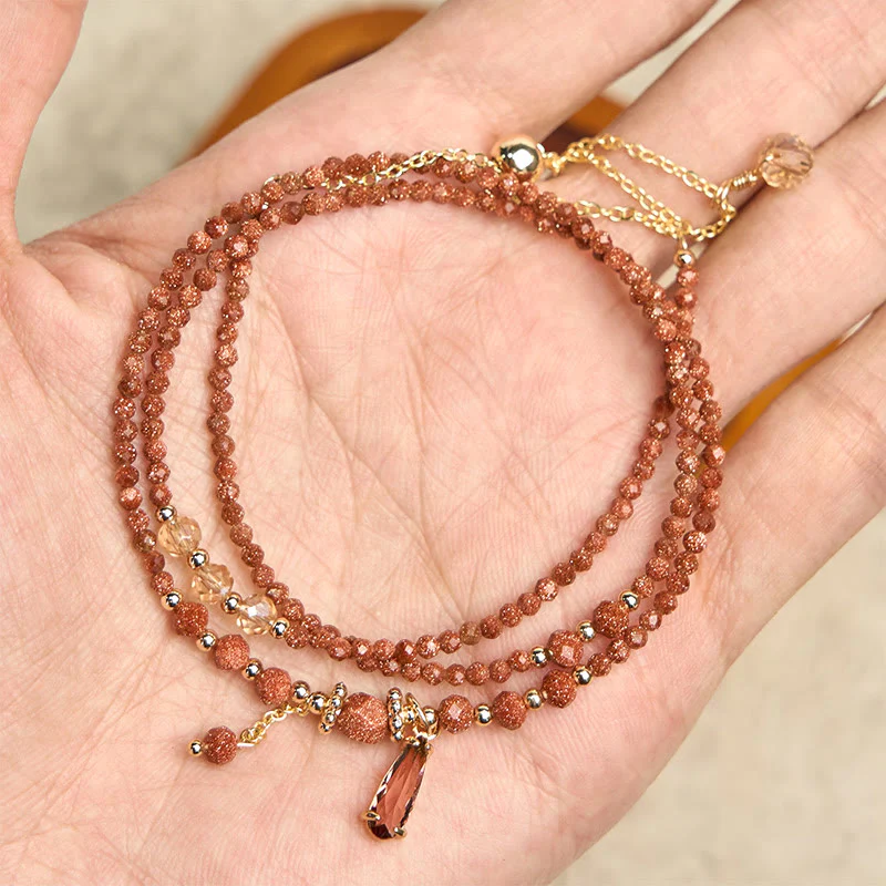 Bracciale multistrato positivo con perline di pietra d'oro naturale da 2 mm Buddha Stones - Image 4