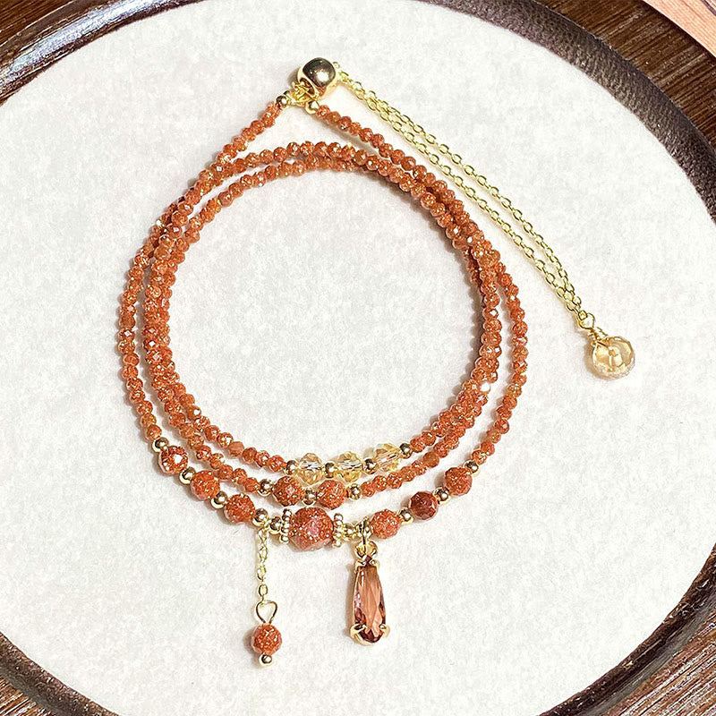 Bracciale multistrato positivo con perline di pietra d'oro naturale da 2 mm Buddha Stones - Image 8