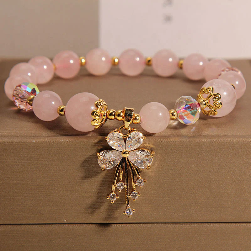 Braccialetto con ciondolo a farfalla in zircone con cristalli rosa e acquamarina Buddha Stones - Image 9