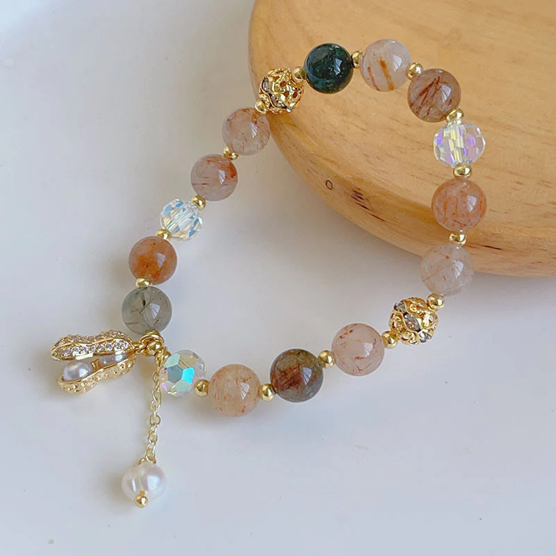 Braccialetto con ciondolo a forma di arachide con quarzo rutilato colorato e pietre del sole Buddha Stones - Image 2