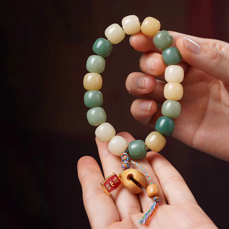 Braccialetto con ciondolo a tamburo di pesce in legno con semi di Bodhi e Buddha Stones, sfumatura naturale - Image 2